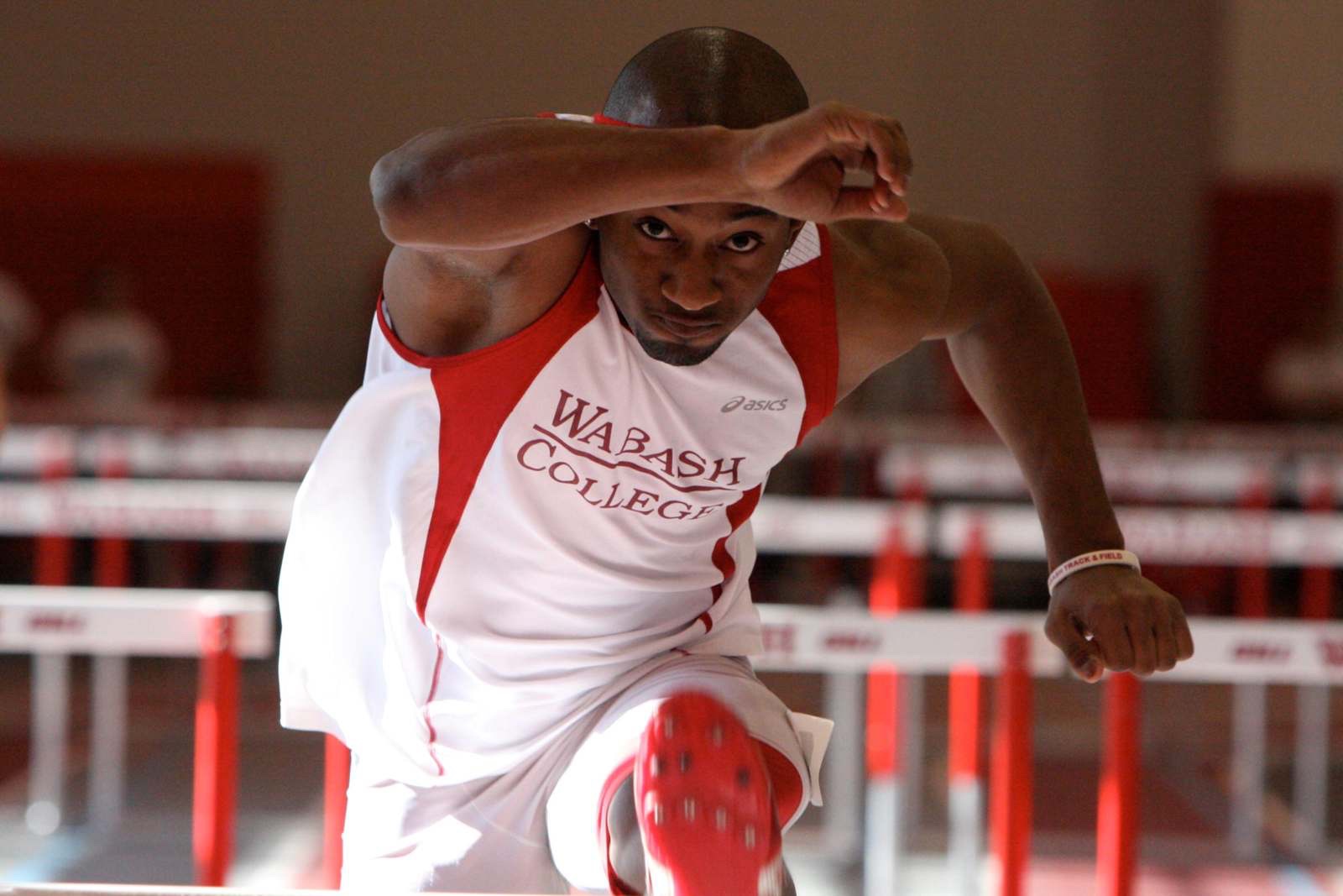 Emmanuel Aouad competing in hurdles for Wabash College.