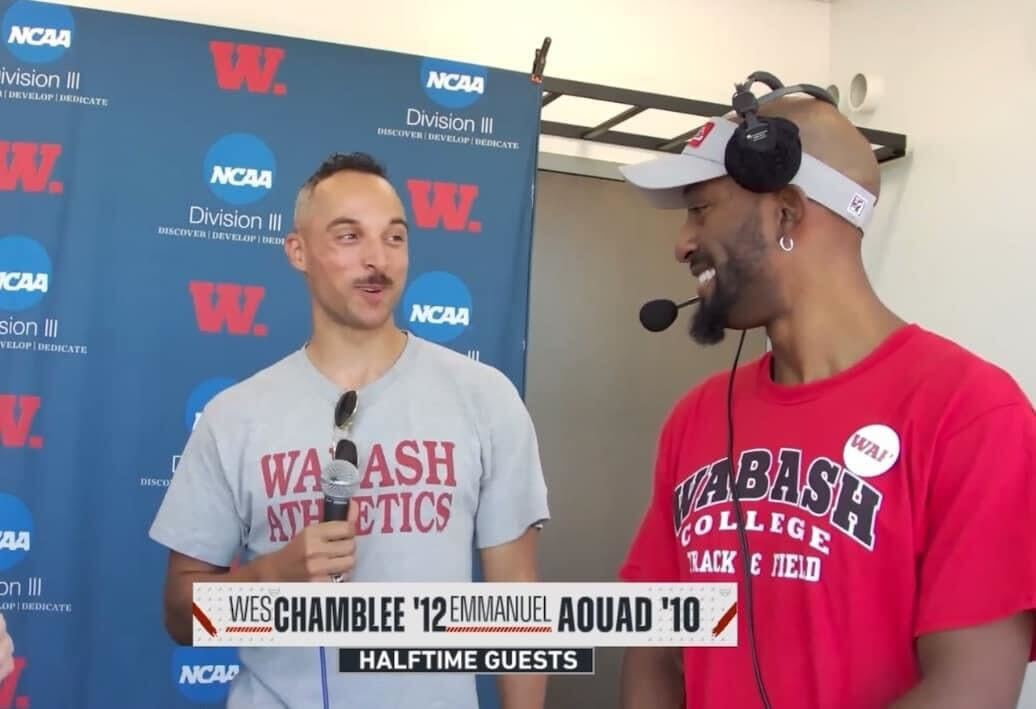 Emmanuel and his college roommate being interviewed together in their Wabash track shirts.
